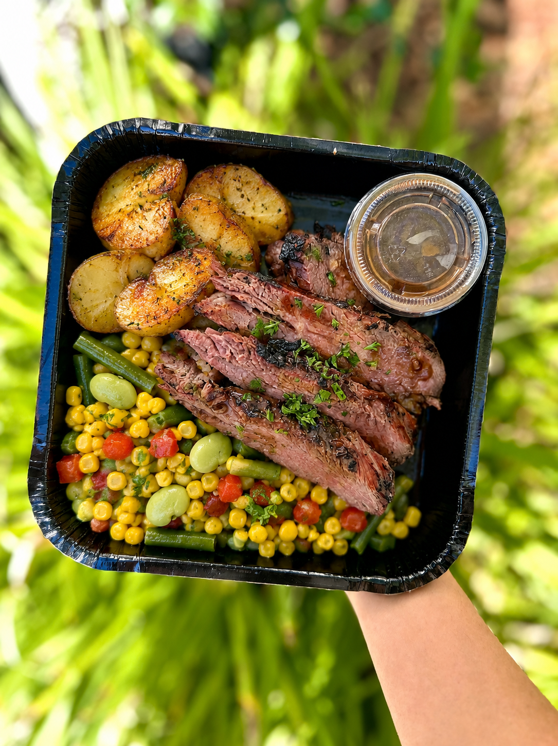 Santa Maria Tri-Tip with Herb Roasted Potatoes, Sweet Corn Succotash, and Balsamic Sauce